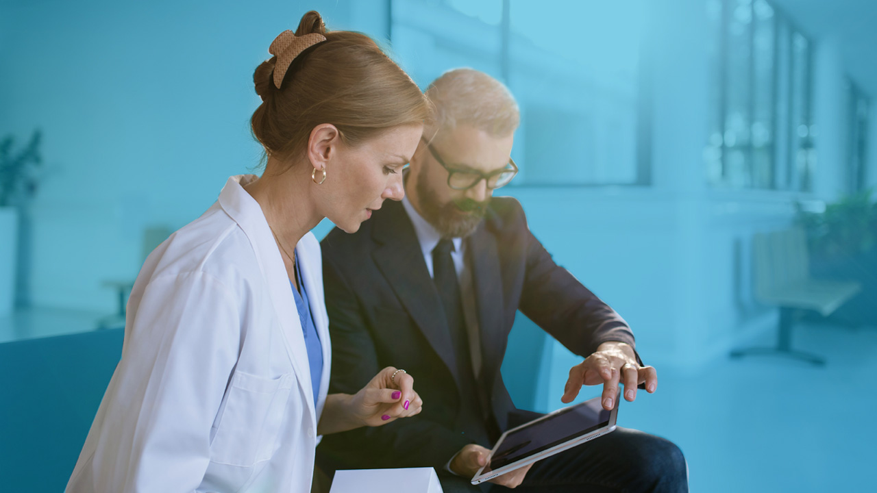 Pharma sales rep detailing physician
